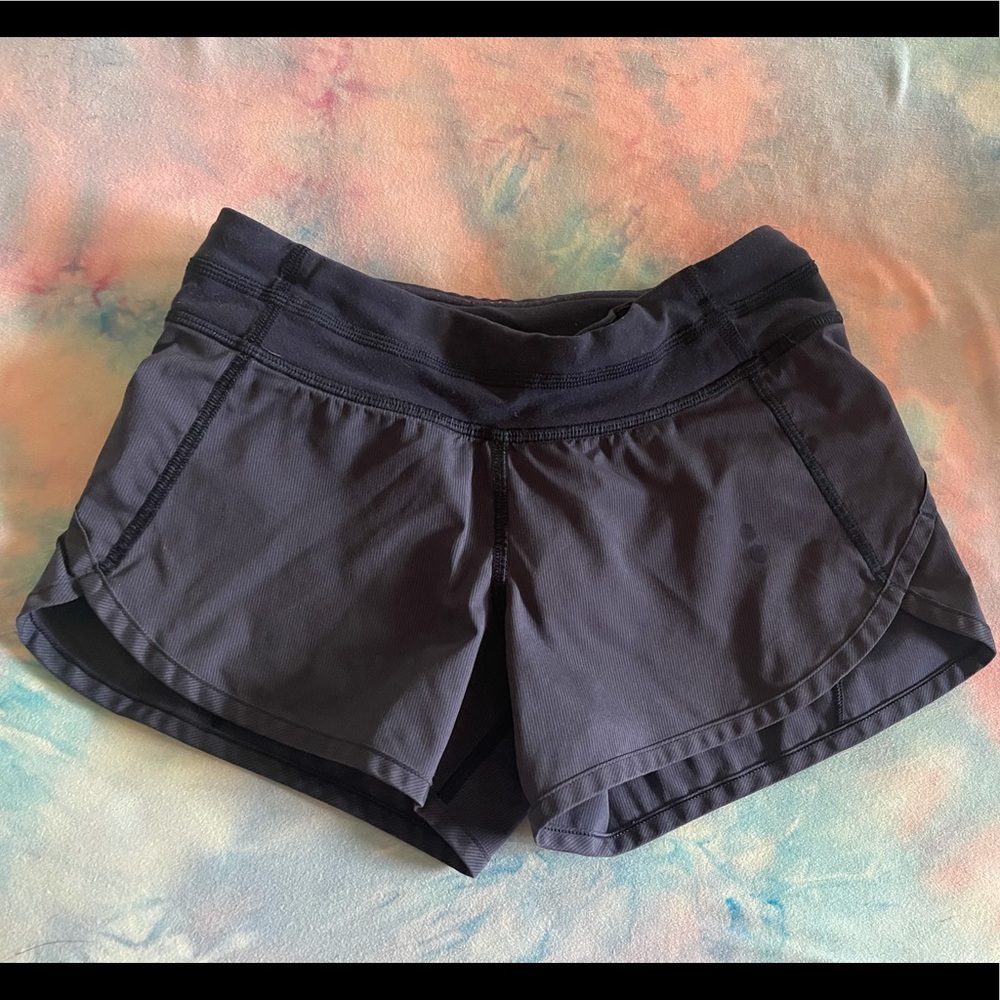 Preowned Ivivva navy blue shorts. Size 8